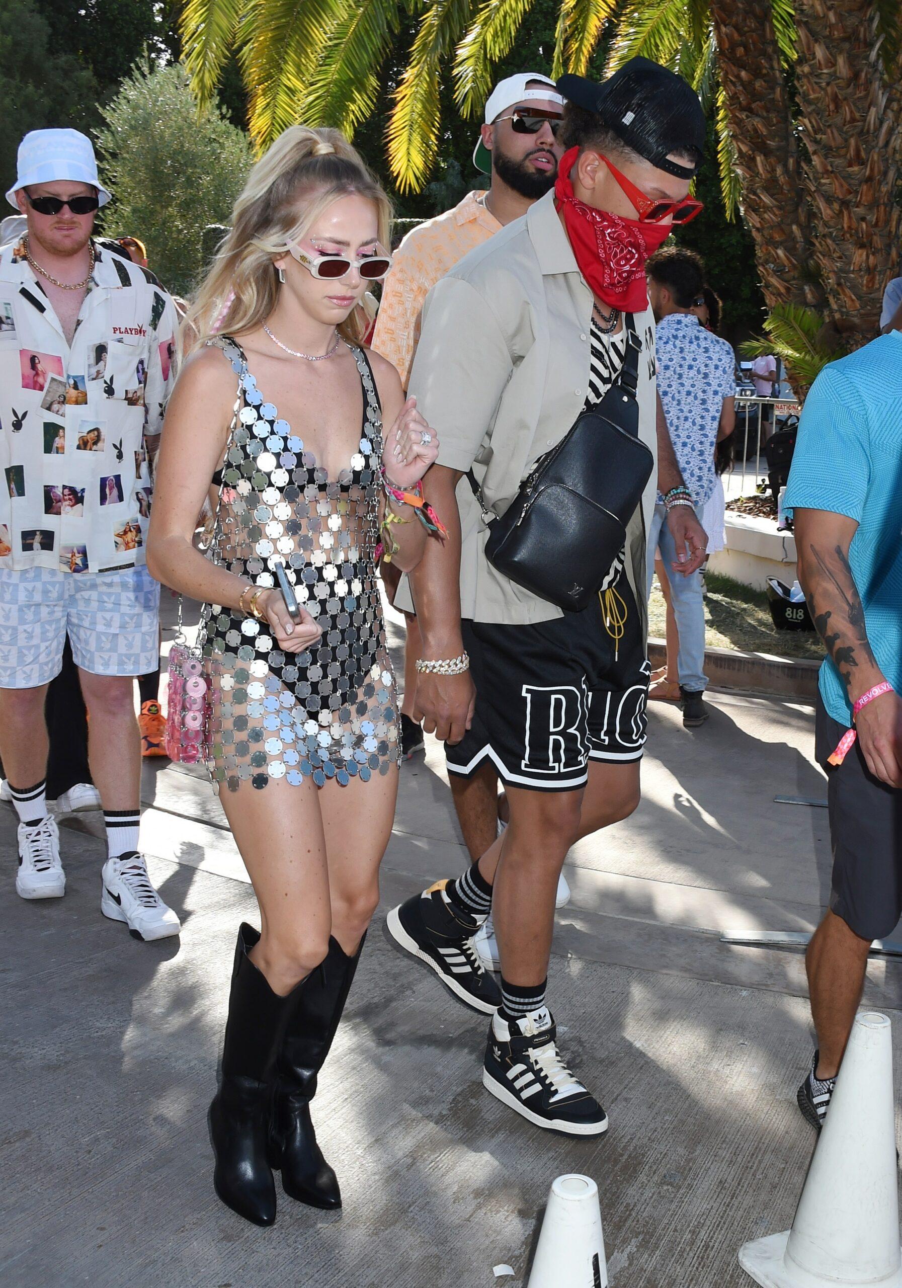 Brittany Mahomes Made a Chic Appearance at a Recent Revolve event Holding a Rainbow-colored Sequined Handbag