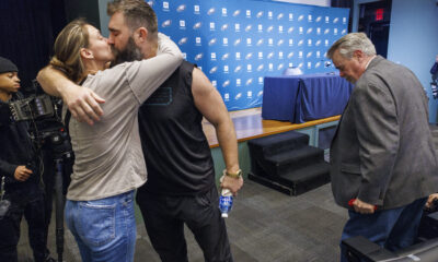 Watch: Jason Kelce kisses wife Kylie after teary NFL retirement speech