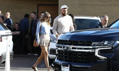 Taylor Swift holds hands with boyfriend Travis Kelce as they enjoy a romantic lunch date at Nobu in Malibu....after returning from Bahamas vacation