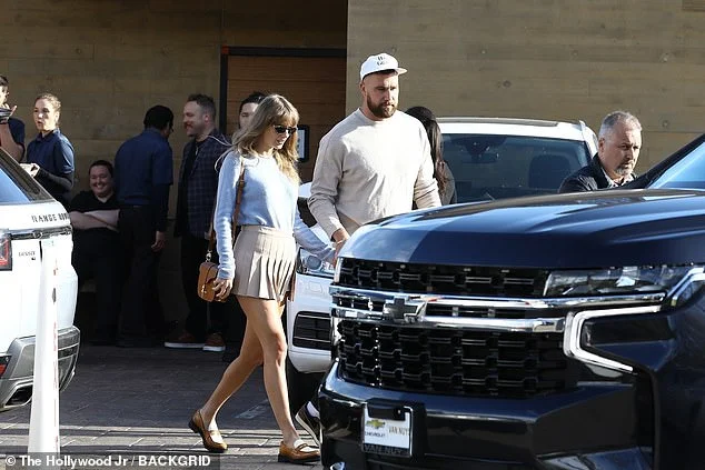 Taylor Swift holds hands with boyfriend Travis Kelce as they enjoy a romantic lunch date at Nobu in Malibu....after returning from Bahamas vacation